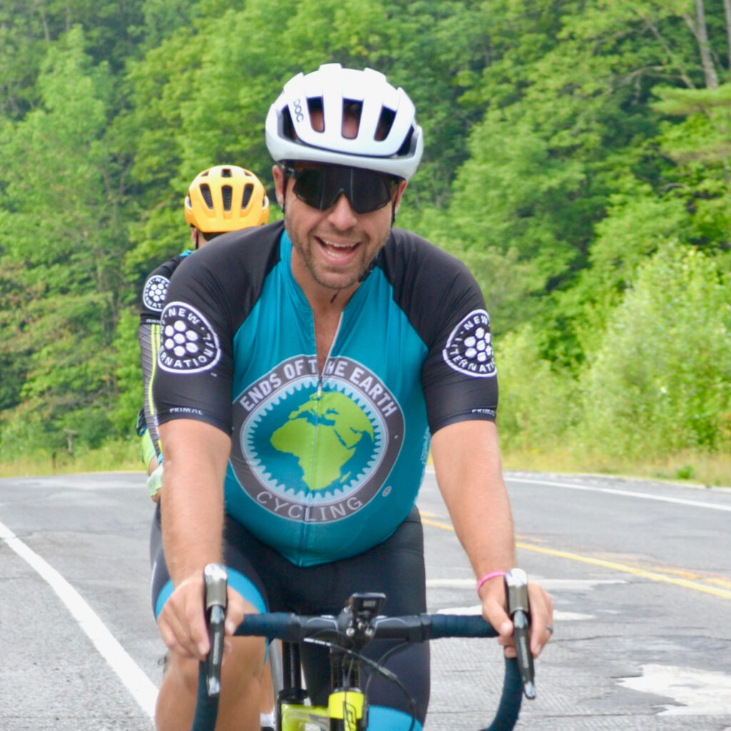 Ends Cycling crew member Justin cycling during a tour