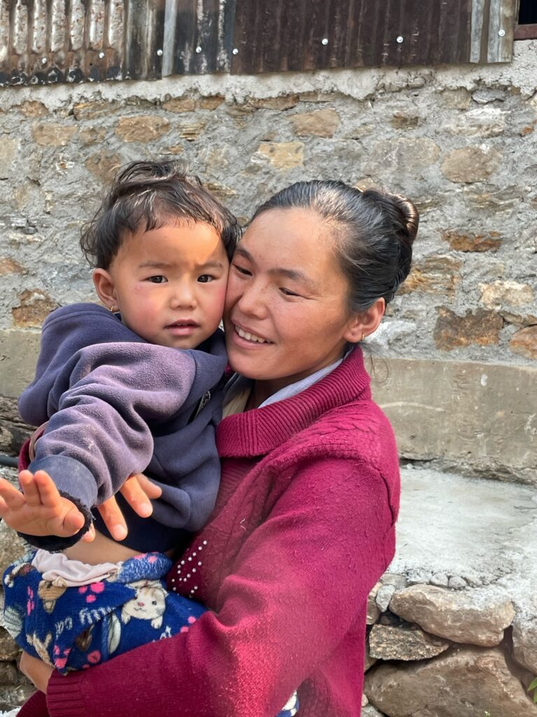 A Mother holding her daughter